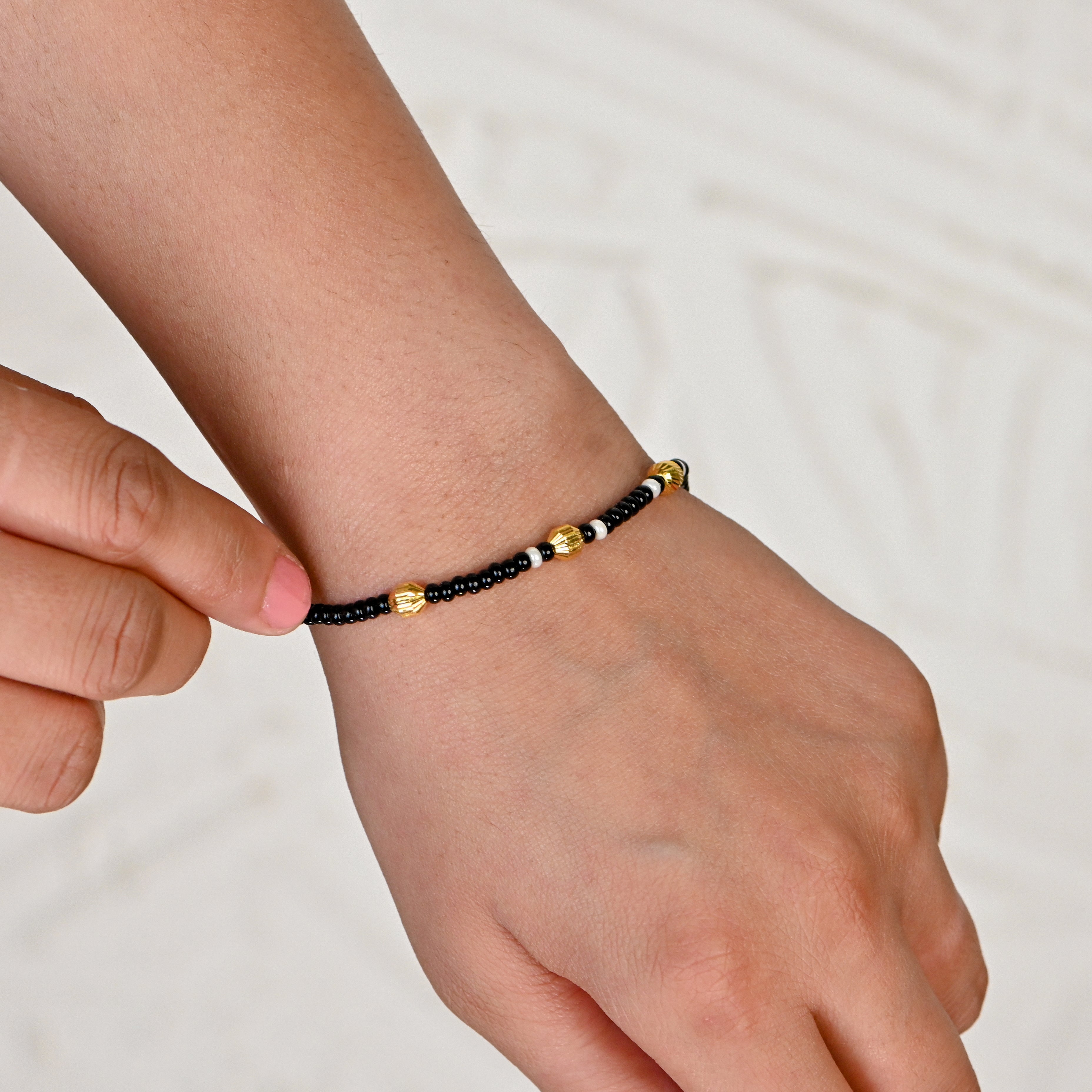 Pair of 22kt Gold Black & Golden Beads Bracelets – Elegant Matching Set